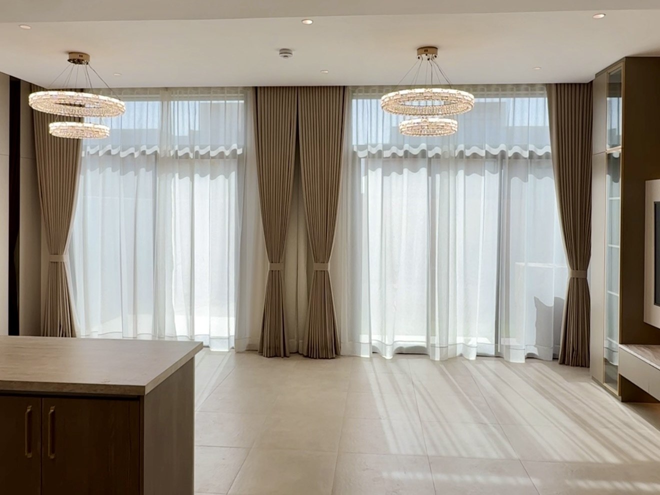 Curtains & Wallpapers by Divano - full-height drapes with sheers and tie-backs